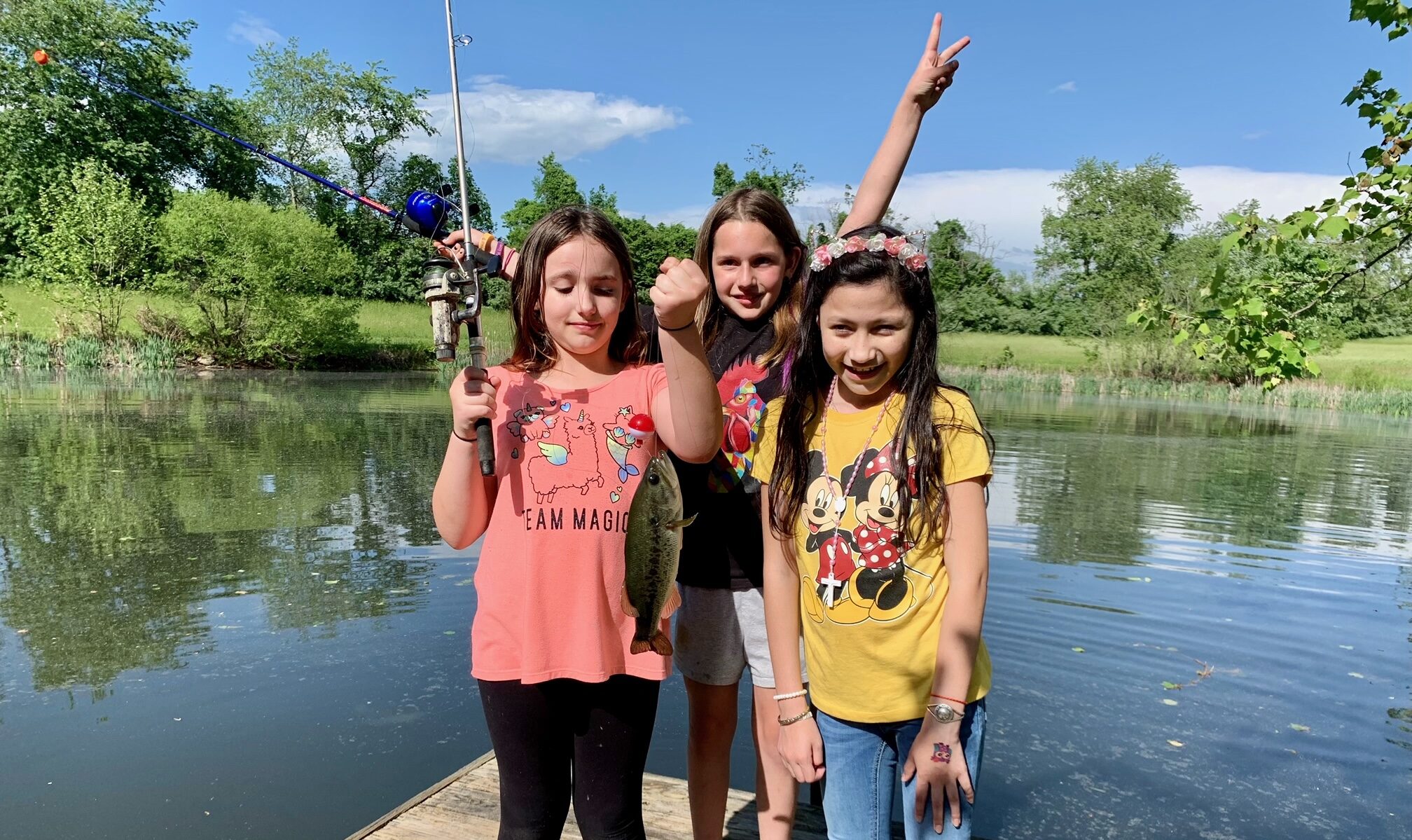 Children in the Starfish Mentoring Program going fishing. 